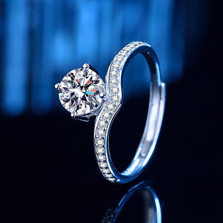 Ladies ring with sparkling zirconia and elegant wave pattern Nin Boutique