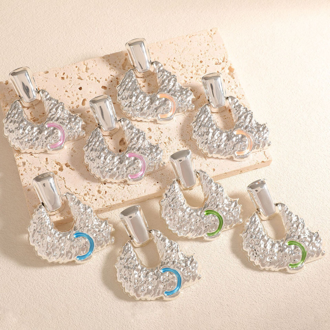 Women's earrings in artistic relief design Nin Boutique