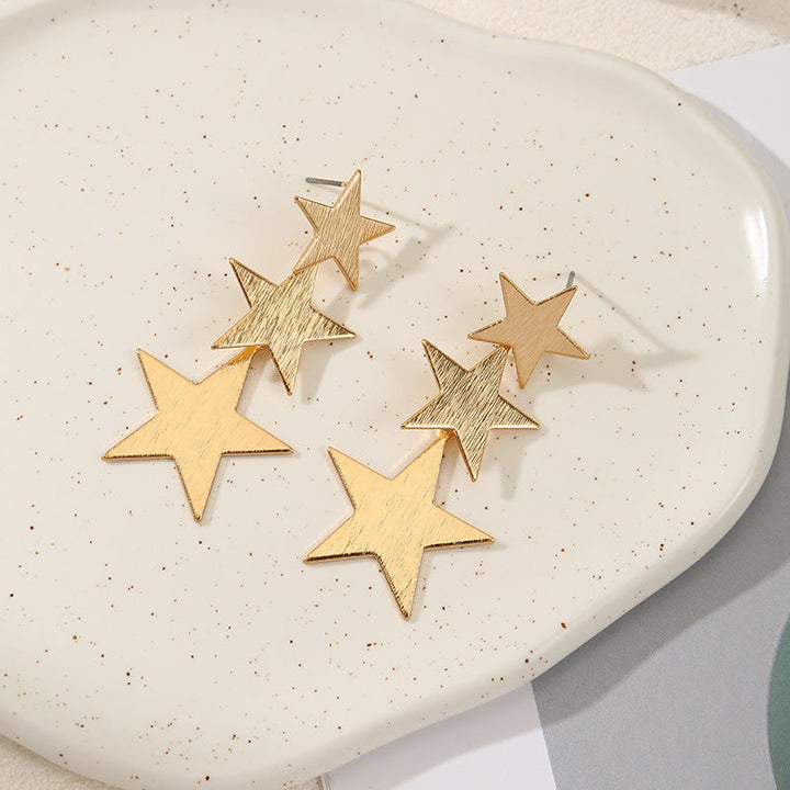 Ladies earrings in modern star design Nin Boutique