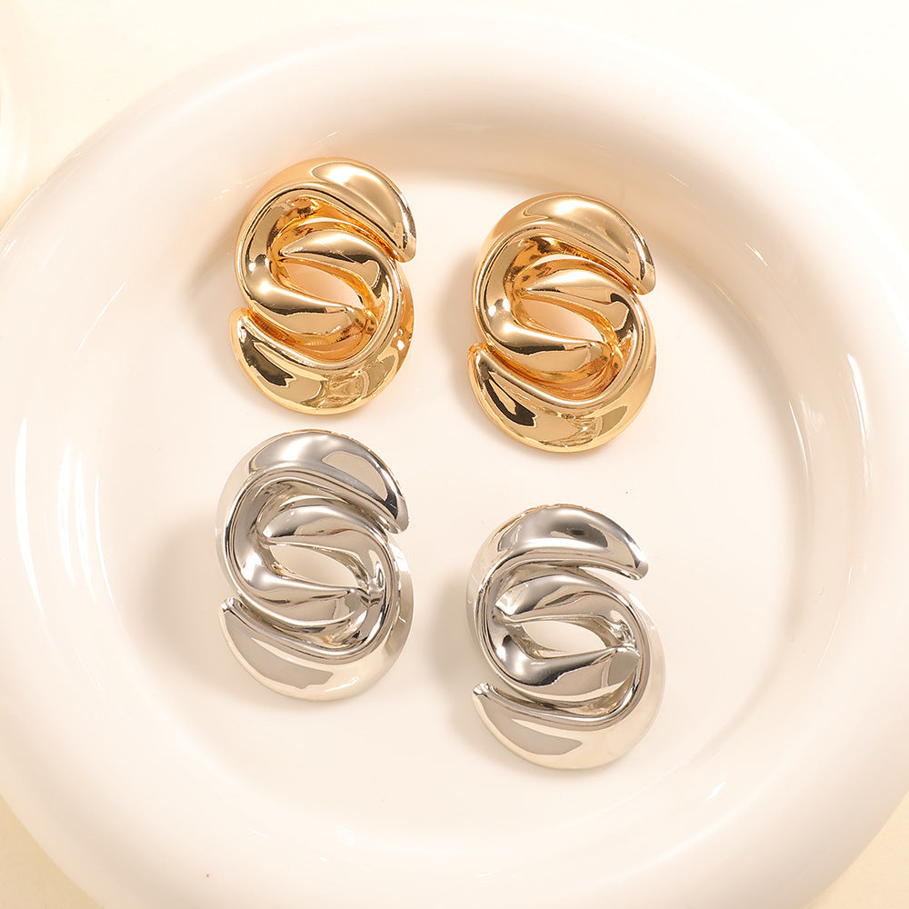 Ladies earrings with elegant, curved design Nin Boutique 1784077352