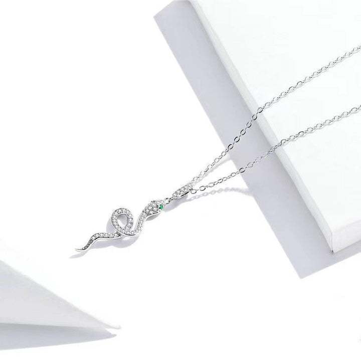 Women's necklace with playful snake pendant and sparkling zirconia Nin Boutique