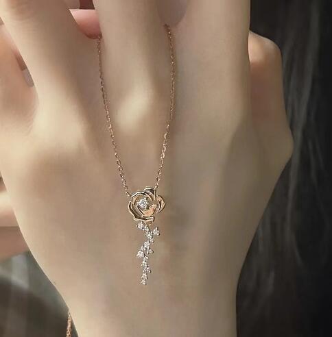 Women's necklace with delicate rose pendant and sparkling accents Nin Boutique