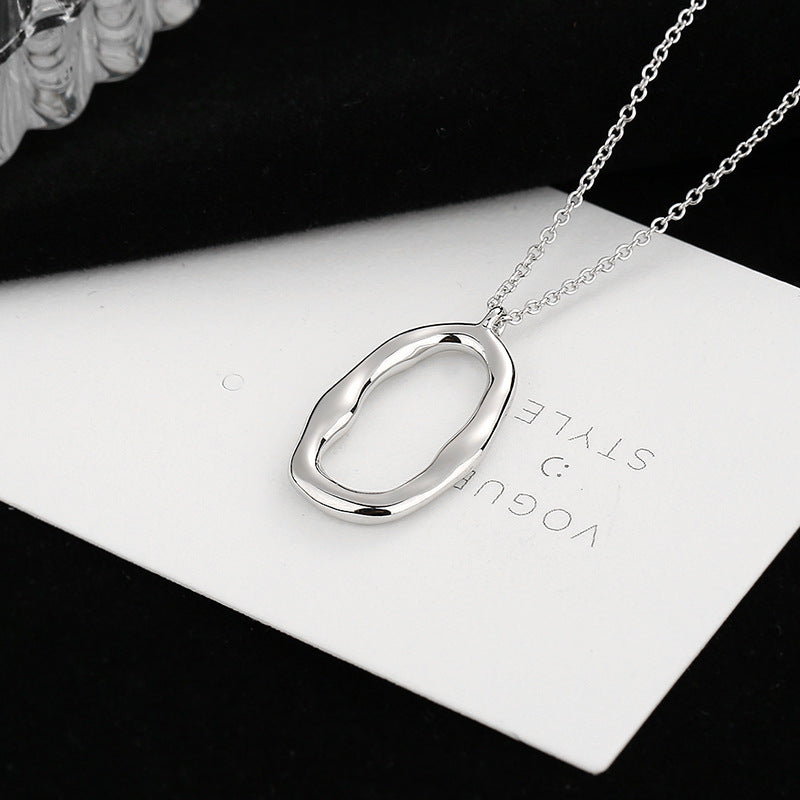 Ladies necklace with modern, organic pendant Nin Boutique