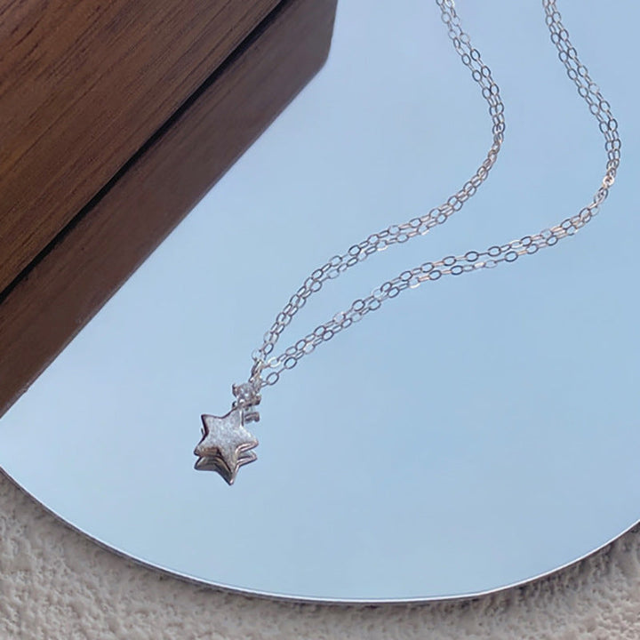 Women's necklace with sparkling star pendant made of high-quality stainless steel Nin Boutique