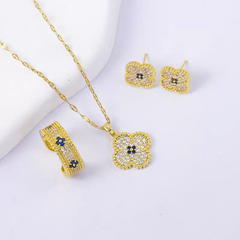 Women's intricate quatrefoil pave cubic zirconia pendant necklace with sapphire accent Nin Boutique