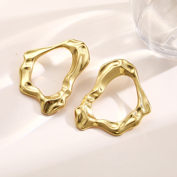 Ladies earrings in modern, flowing design Nin Boutique