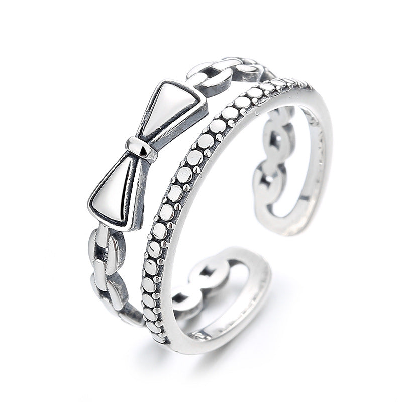 Ladies fashionable ring with playful bow design and elegant details Nin Boutique