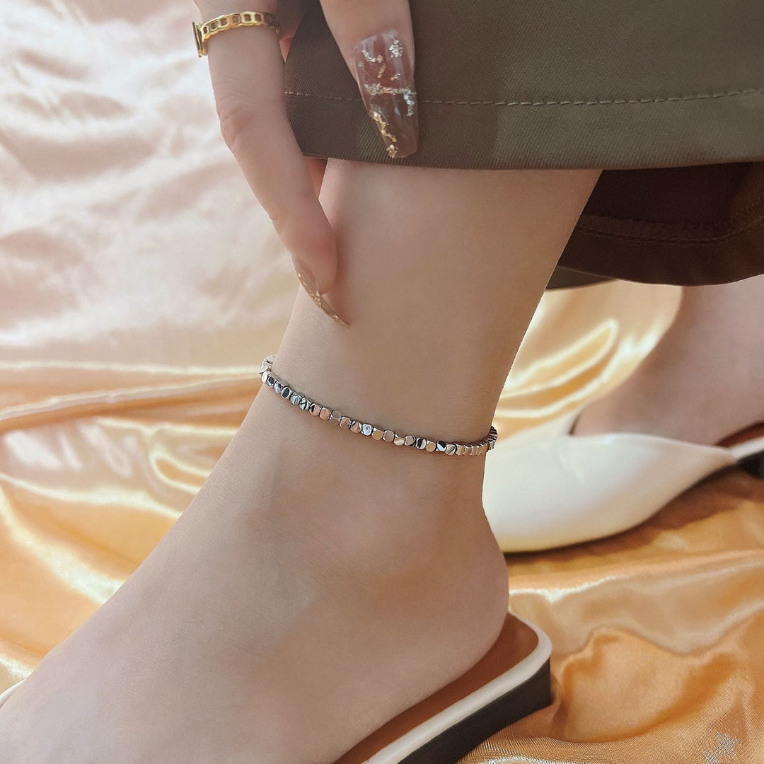 Women's filigree anklet made of shiny metal Nin Boutique