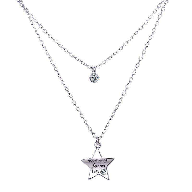 Women’s necklace with cheeky star pendant and sparkling detail Nin Boutique