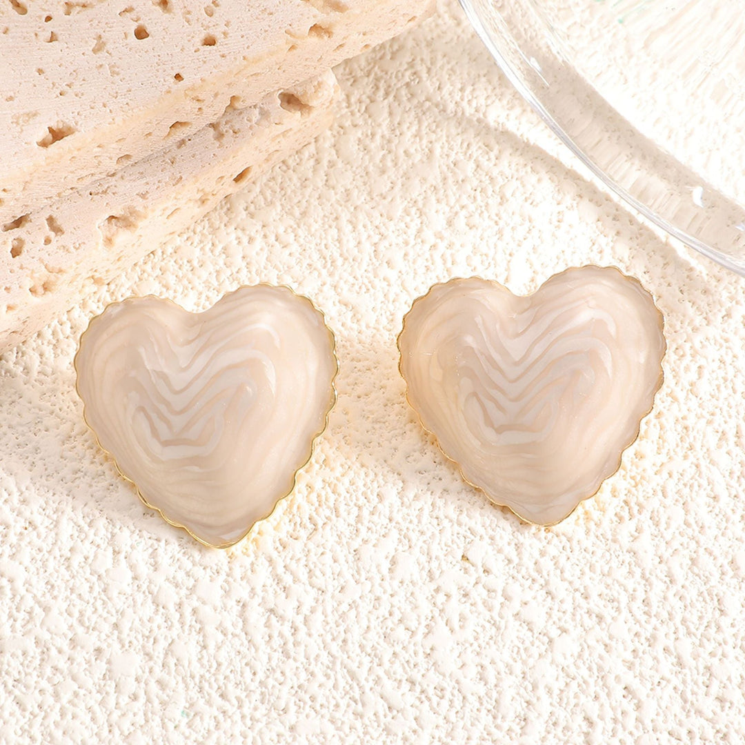 Women’s stud earrings with intricate heart design made of high-quality epoxy resin Nin Boutique