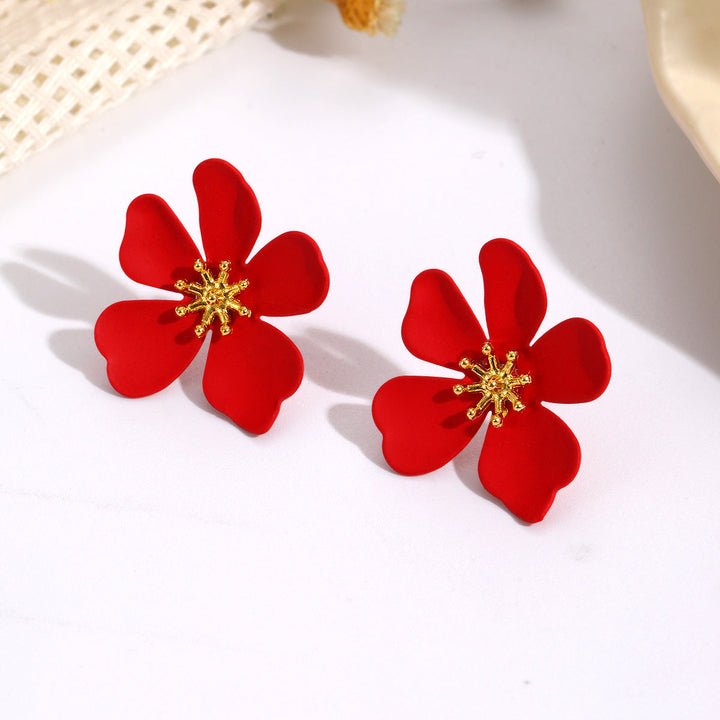Women's earrings in floral design with shiny golden accent Nin Boutique