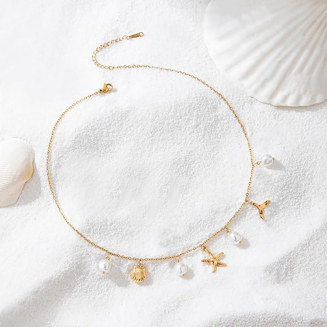 Women's necklace in maritime style with shells and pearl pendants Nin Boutique