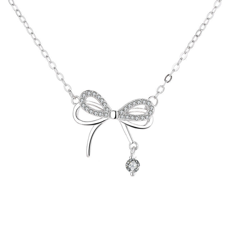 Women's necklace with intricate bow pendant and sparkling zirconia Nin Boutique