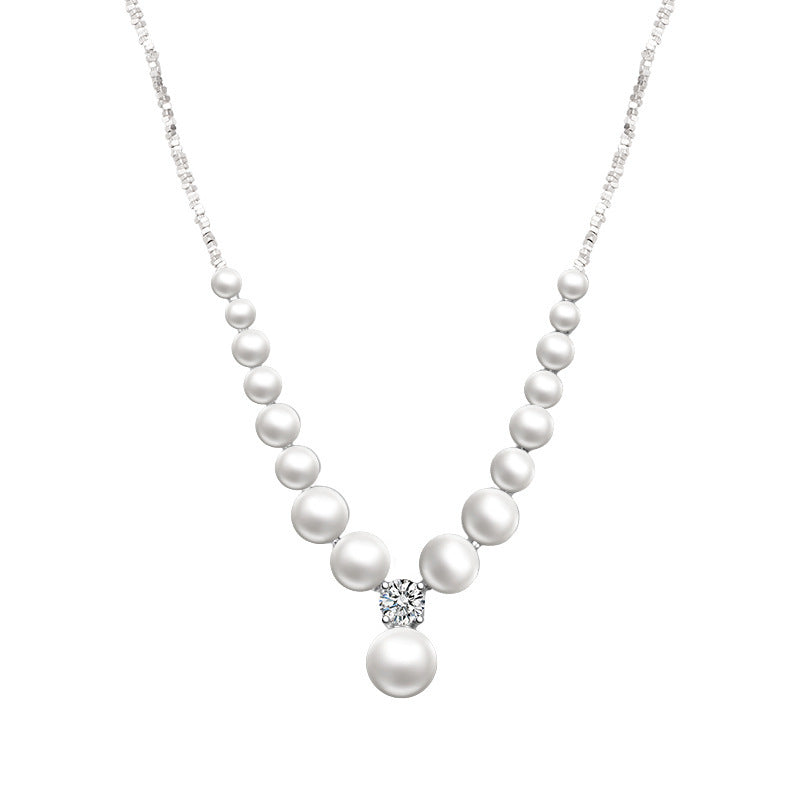Women's necklace with shimmering pearls and sparkling details Nin Boutique