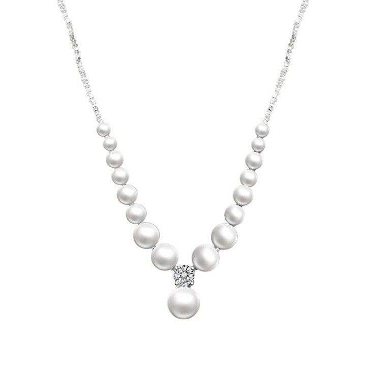 Women's necklace with shimmering pearls and sparkling details Nin Boutique