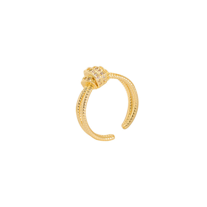 Ladies ring with elaborate, multi-layered design and zirconia appliqués Nin Boutique