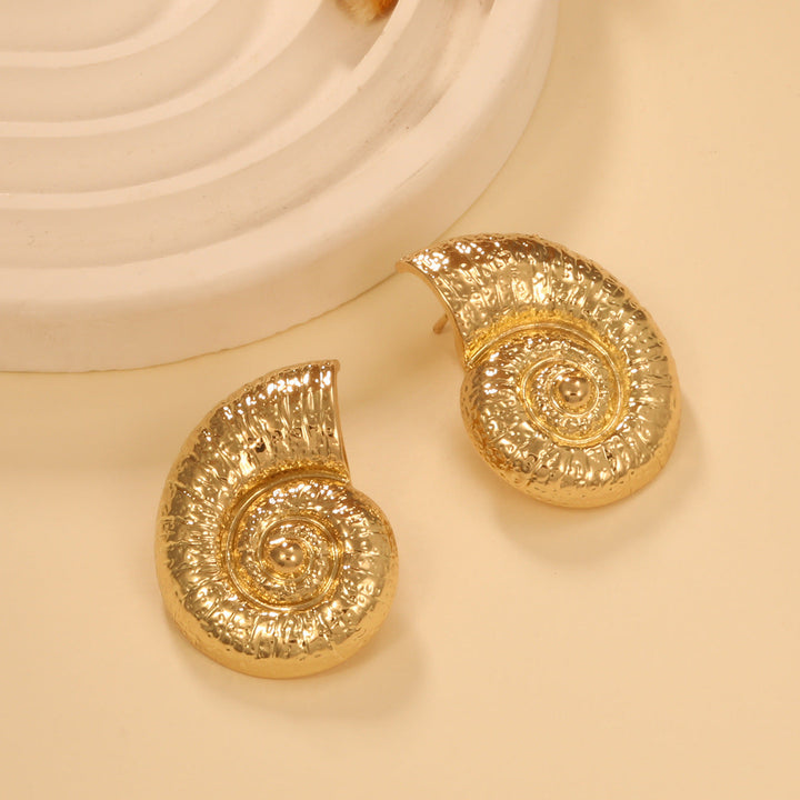 Ladies earrings in elegant shell design Nin Boutique