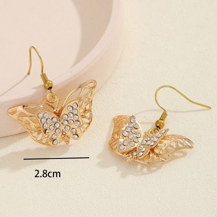 Ladies earrings with intricate butterfly design Nin Boutique