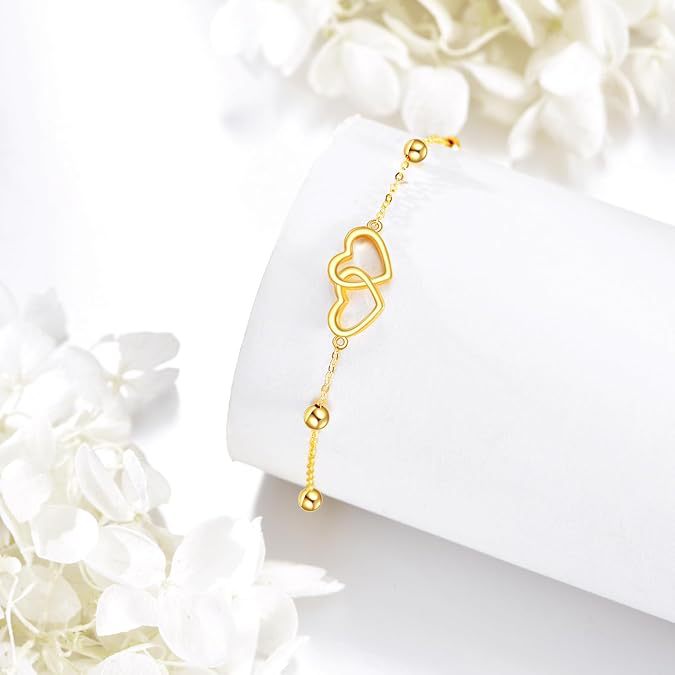 Ladies ankle bracelet with interlocking heart pendants and delicate design Nin Boutique
