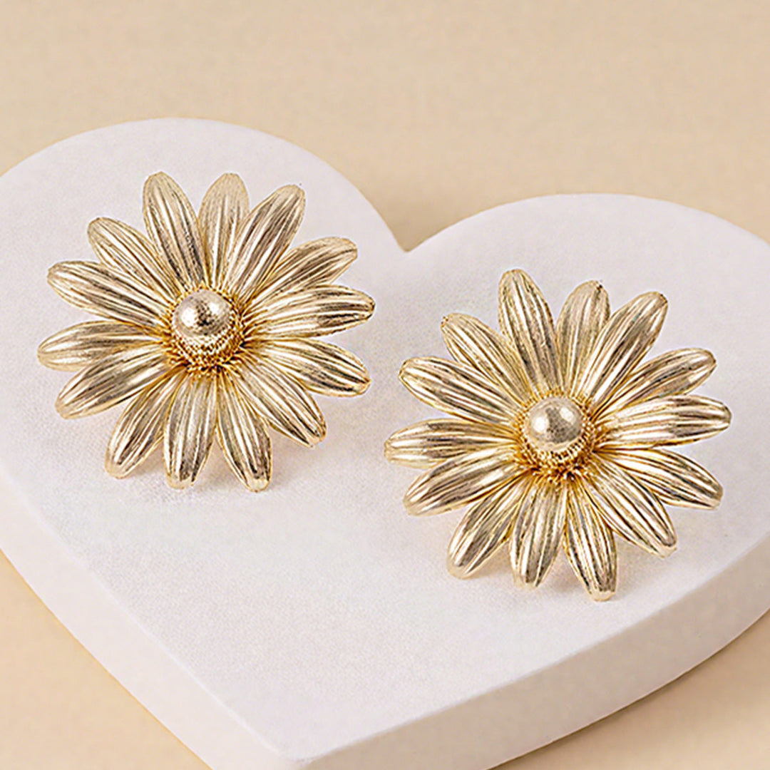 Ladies earrings in intricate flower design Nin Boutique