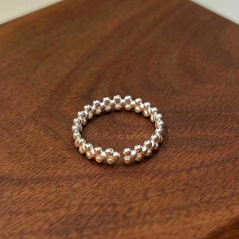 Women’s ring with playful pearl pattern Nin Boutique
