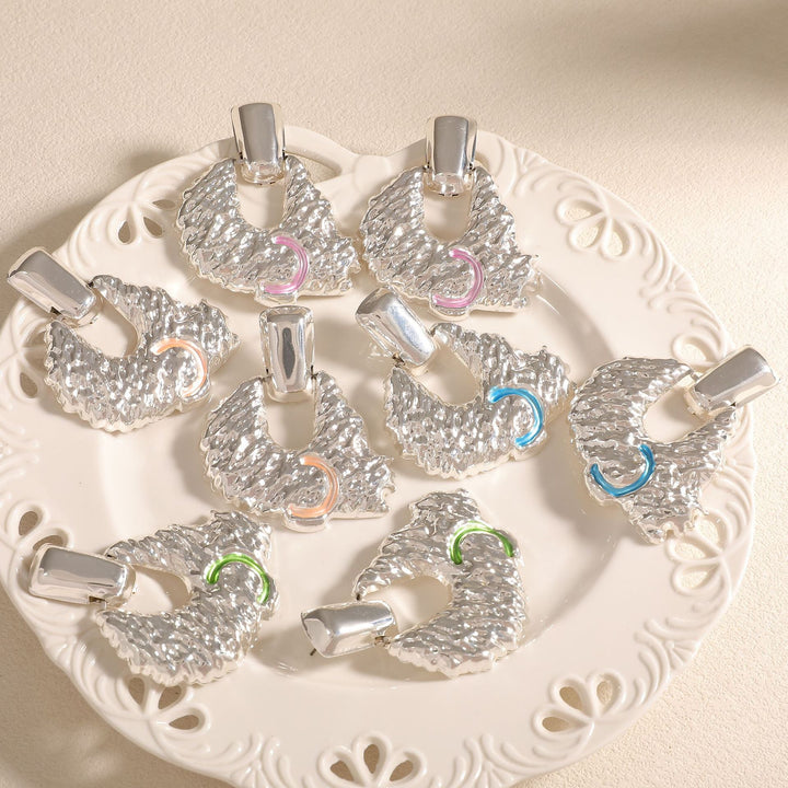 Women's earrings in artistic relief design Nin Boutique