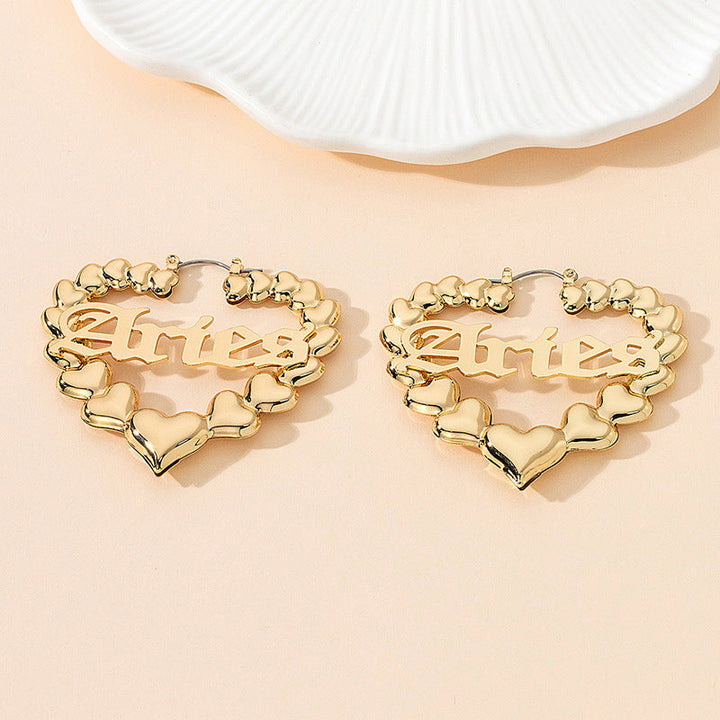 Women’s earrings with unique heart design and astrological element Nin Boutique