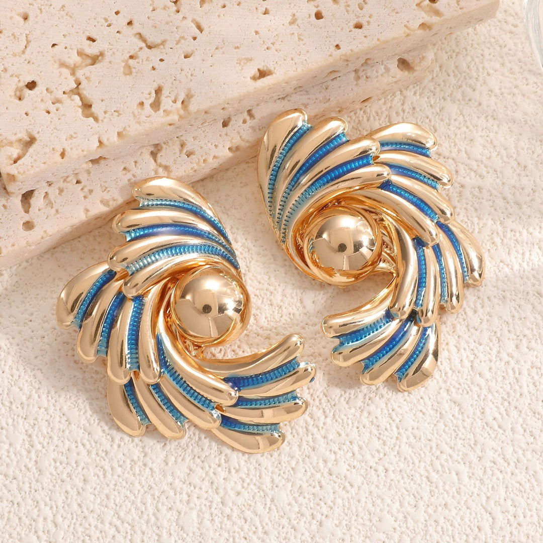 Ladies earrings with ornate wave pattern Nin Boutique