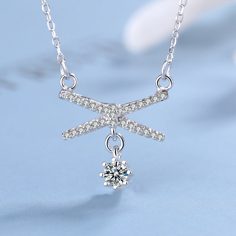 Women's necklace with artistic X design and sparkling pendant Nin Boutique
