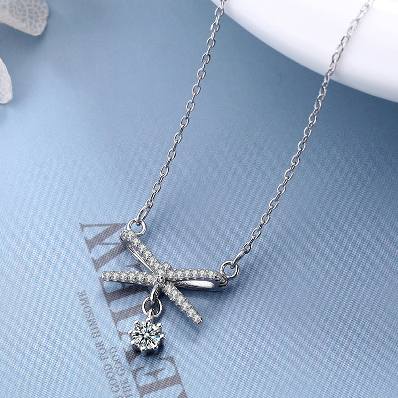 Women's necklace with artistic X design and sparkling pendant Nin Boutique