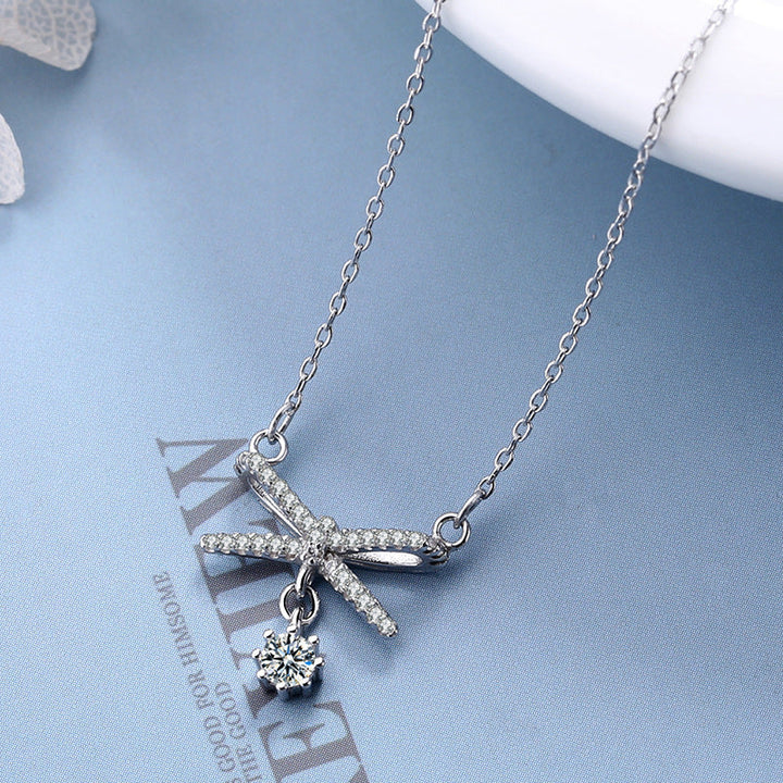 Women's necklace with artistic X design and sparkling pendant Nin Boutique