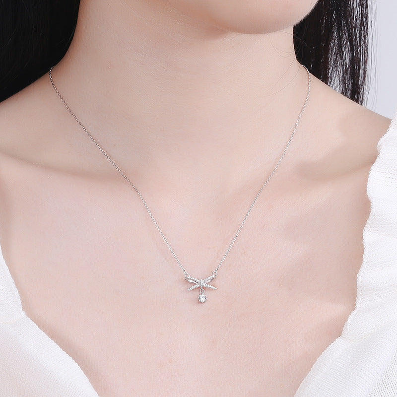 Women's necklace with artistic X design and sparkling pendant Nin Boutique
