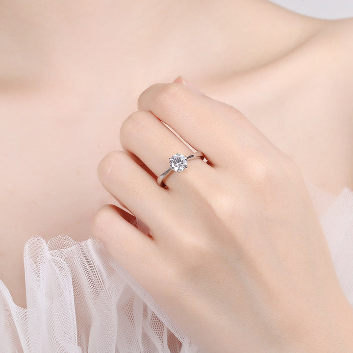 Women's ring with sparkling zircon and modern, curved design Nin Boutique