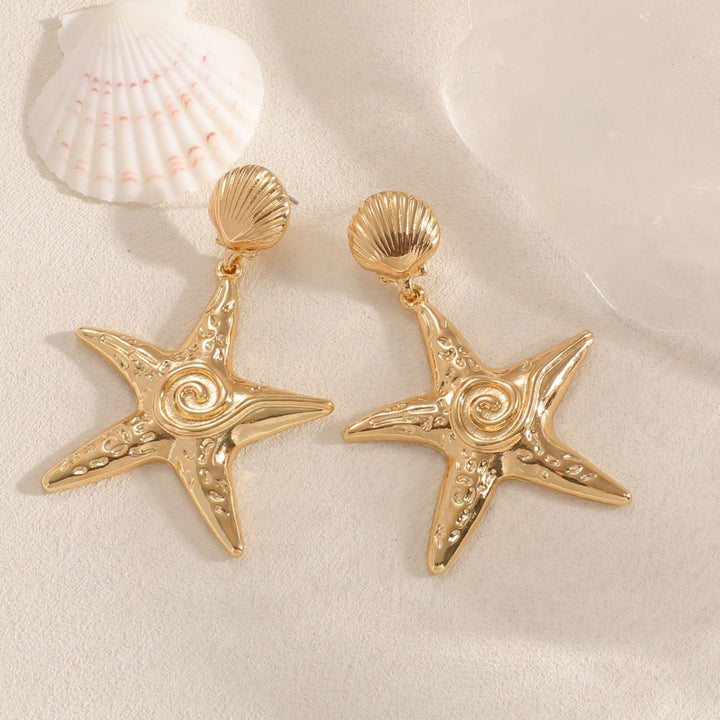 Women’s earrings in shell design Nin Boutique