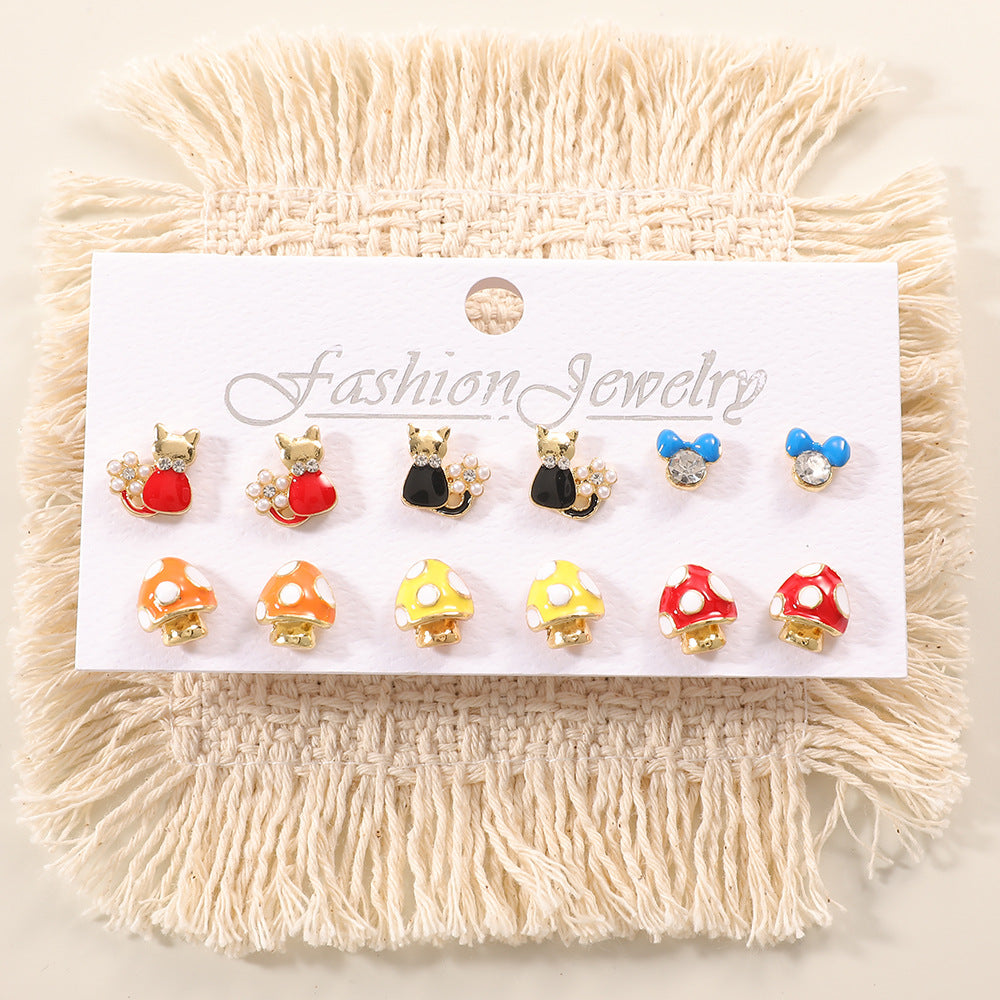 Ladies earring set with playful animal and mushroom design Nin Boutique