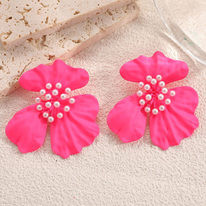 Ladies earrings in artistic floral design with pearls Nin Boutique