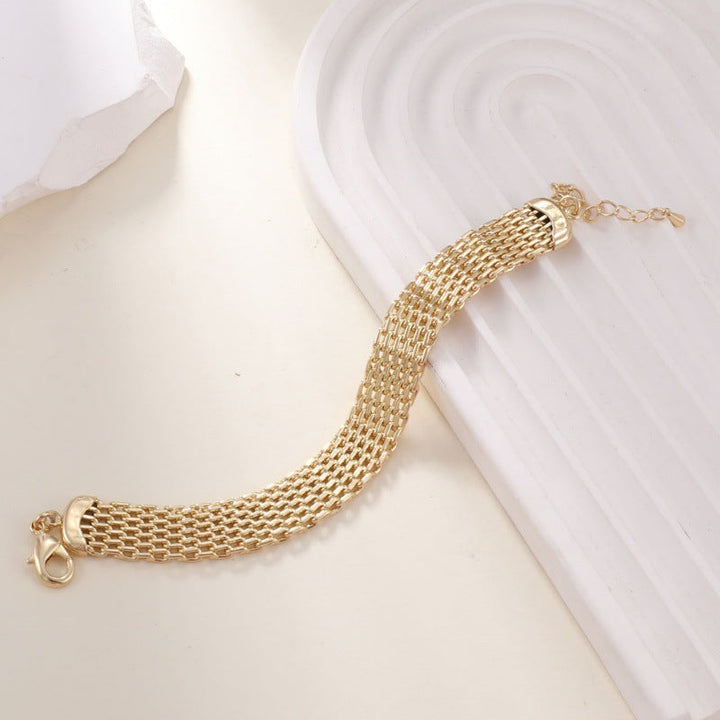 Ladies' cuff bracelet with intricate wave pattern Nin Boutique