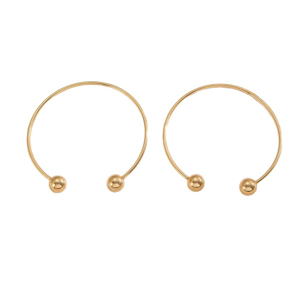 Women's cuff with modern, curved design Nin Boutique