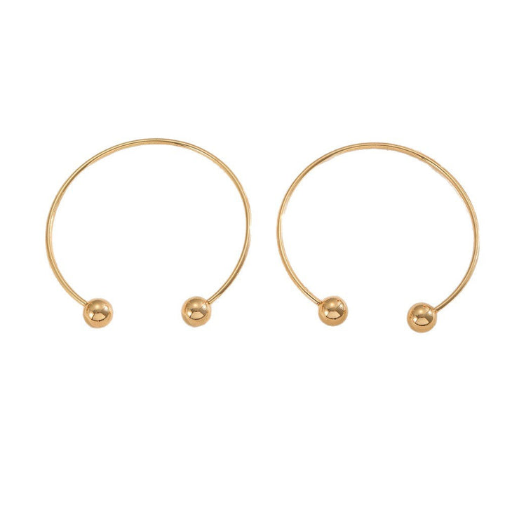 Women's cuff with modern, curved design Nin Boutique