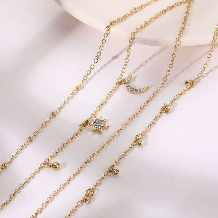 Ladies ankle bracelet with delicate design and charming pendants Nin Boutique