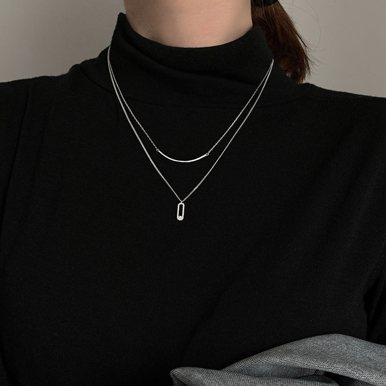 Women's necklace with modern, two-layer design and sparkling pendant Nin Boutique