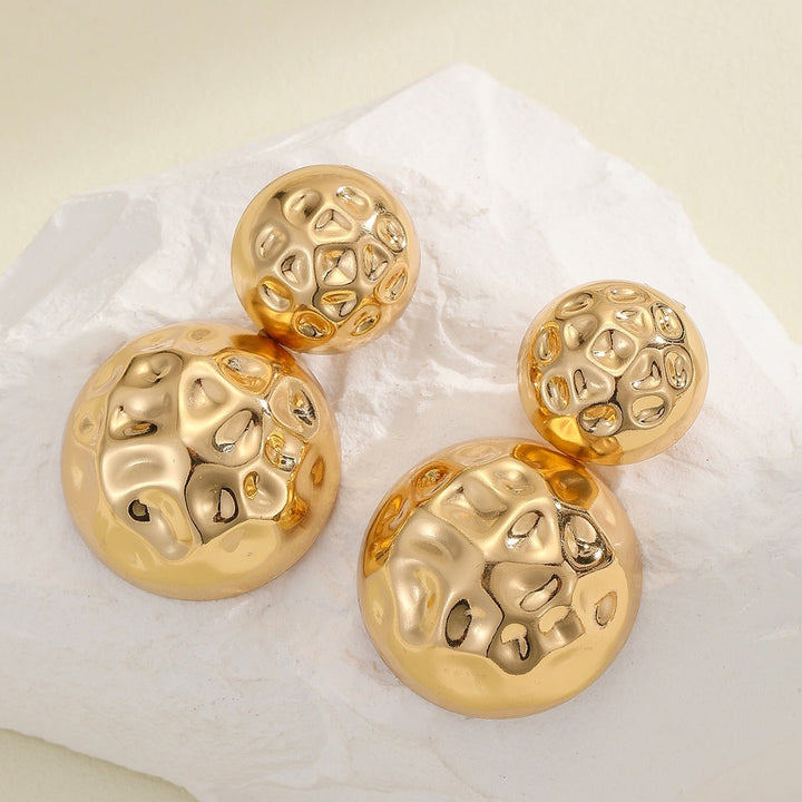 Women earrings in modern sculptural design Nin Boutique
