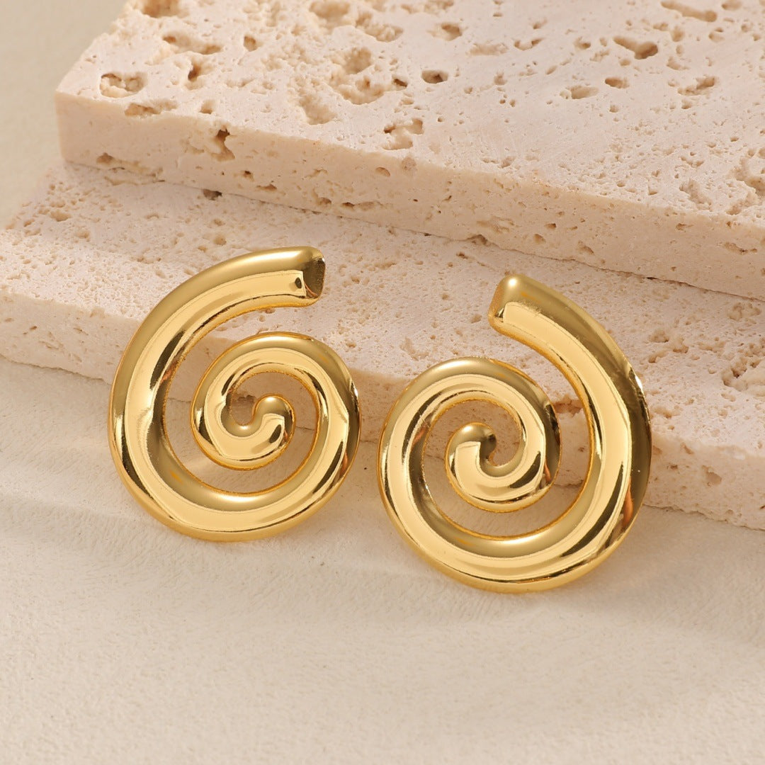 Ladies earrings with modern spiral pattern Nin Boutique