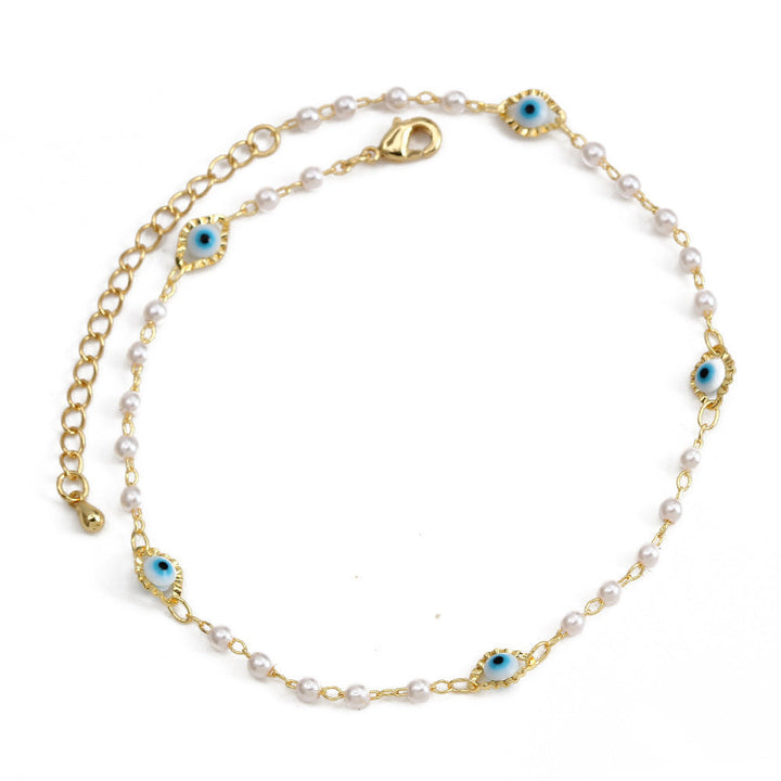 Women's ankle bracelet with protective eye and delicate pearl elements Nin Boutique