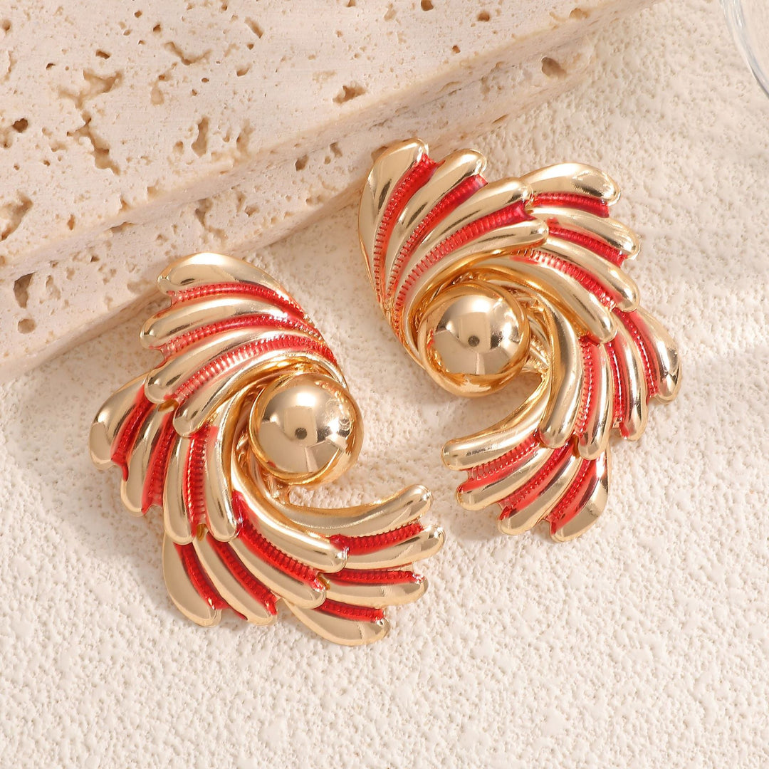 Ladies earrings with ornate wave pattern Nin Boutique