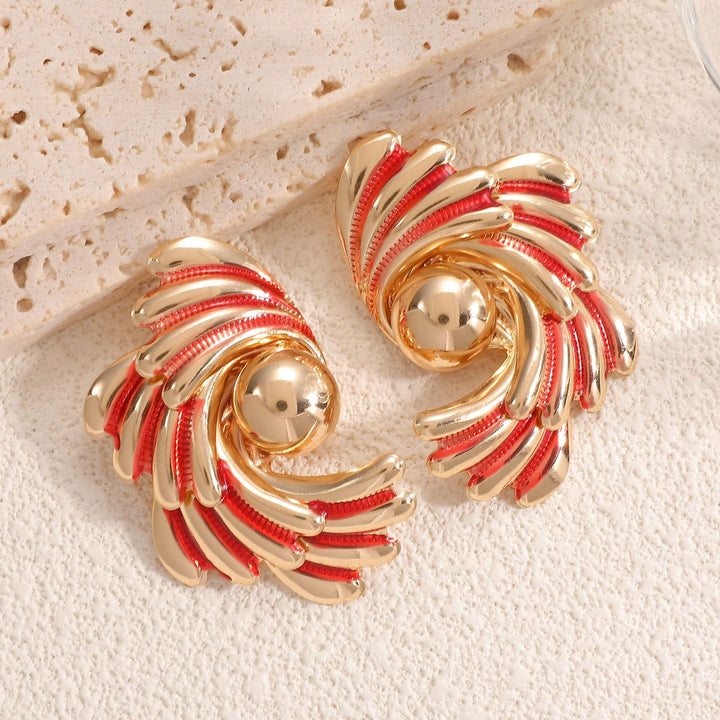Ladies earrings with ornate wave pattern Nin Boutique