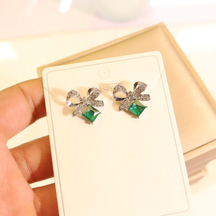 Women's vintage bow cocktail ring with square-cut gemstone simulant and pavé crystal accents Nin Boutique