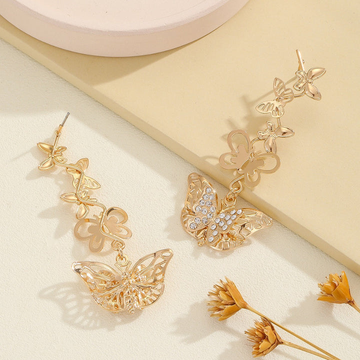 Ladies earrings with elaborate butterfly design Nin Boutique