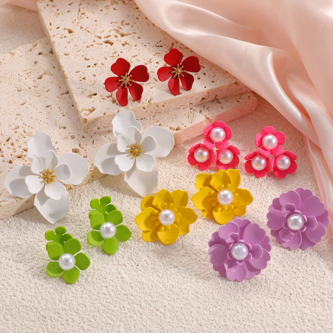 Ladies earrings in artistic floral style with pearl accent Nin Boutique