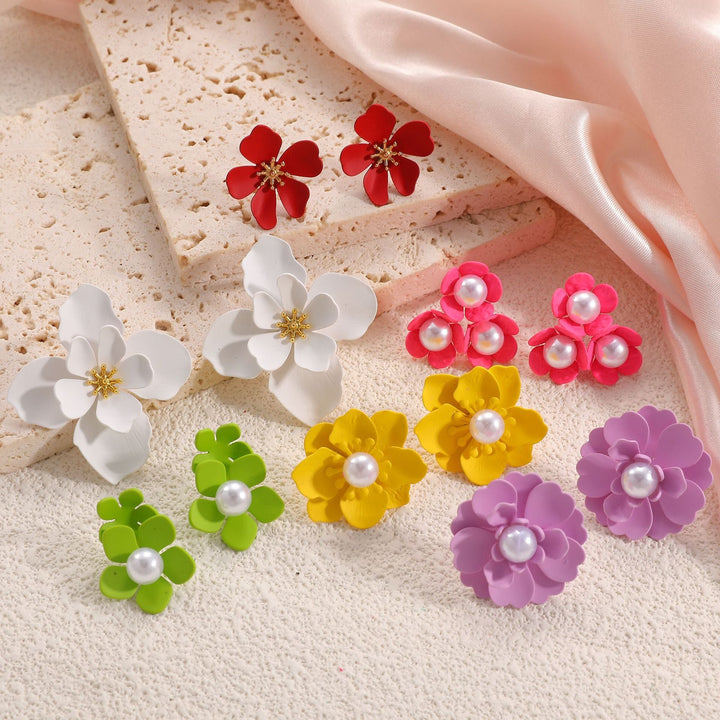 Ladies earrings in artistic floral style with pearl accent Nin Boutique